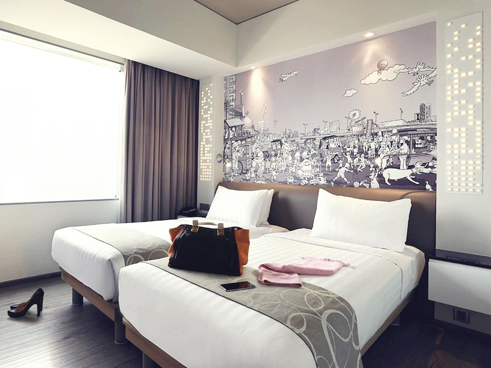Habitación superior con 2 camas individuales del hotel Mercure Jakarta Simatupang. Foto 2