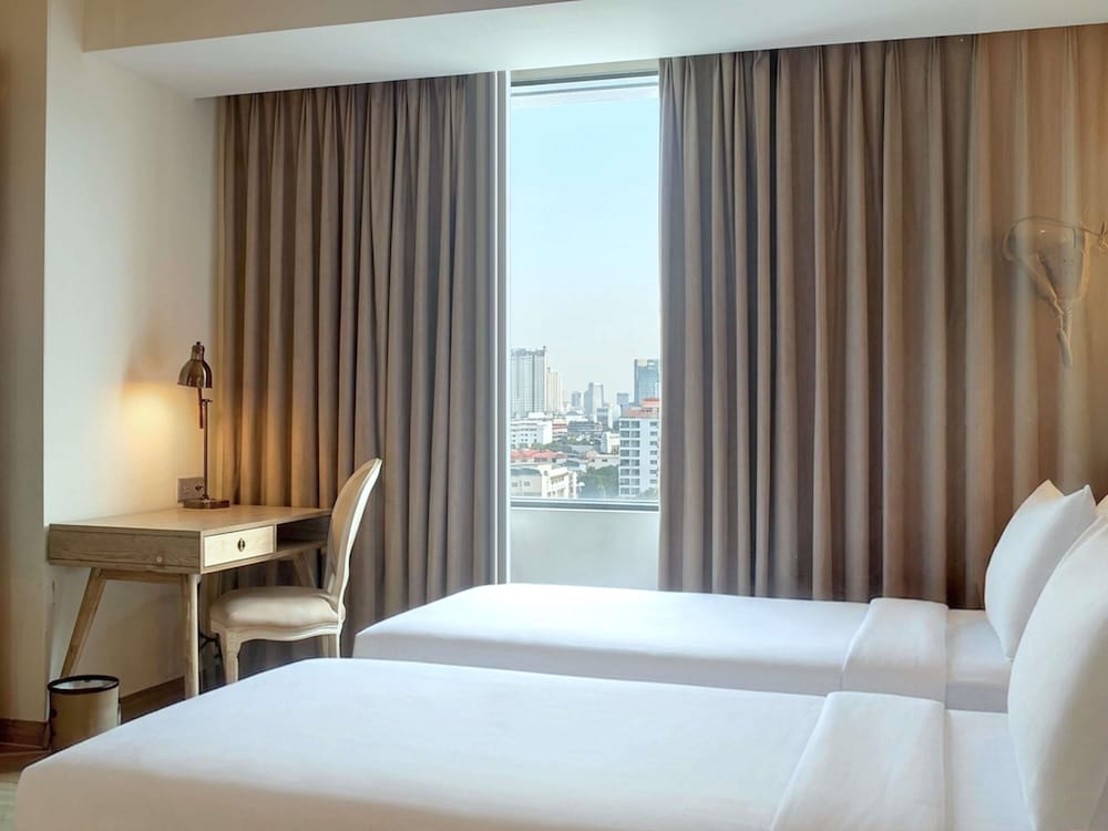 Habitación superior con 2 camas individuales del hotel Mercure Jakarta Simatupang. Foto 3