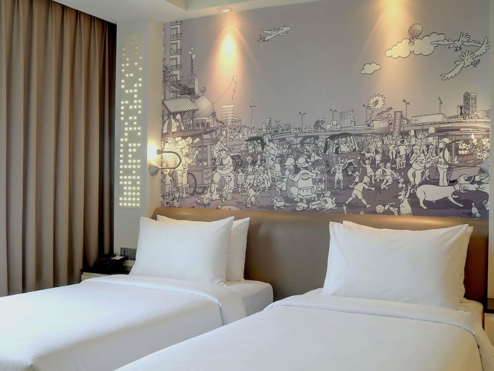Habitación superior con 2 camas individuales del hotel Mercure Jakarta Simatupang. Foto 7