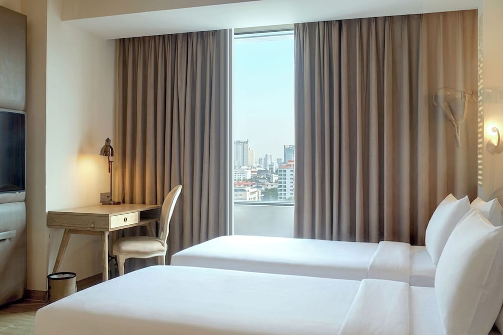 Habitación superior con 2 camas individuales del hotel Mercure Jakarta Simatupang. Foto 28