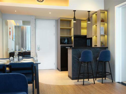 One - Bedroom Pullman Suite Apartment with Central Park View del hotel Pullman Jakarta Central Park. Foto 3