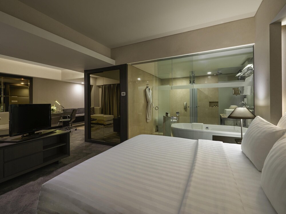 Habitación Deluxe, 1 cama de matrimonio grande del hotel Pullman Jakarta Indonesia
