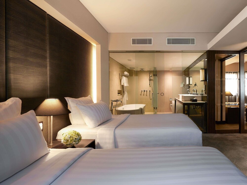 Habitación Deluxe, 2 camas individuales del hotel Pullman Jakarta Indonesia