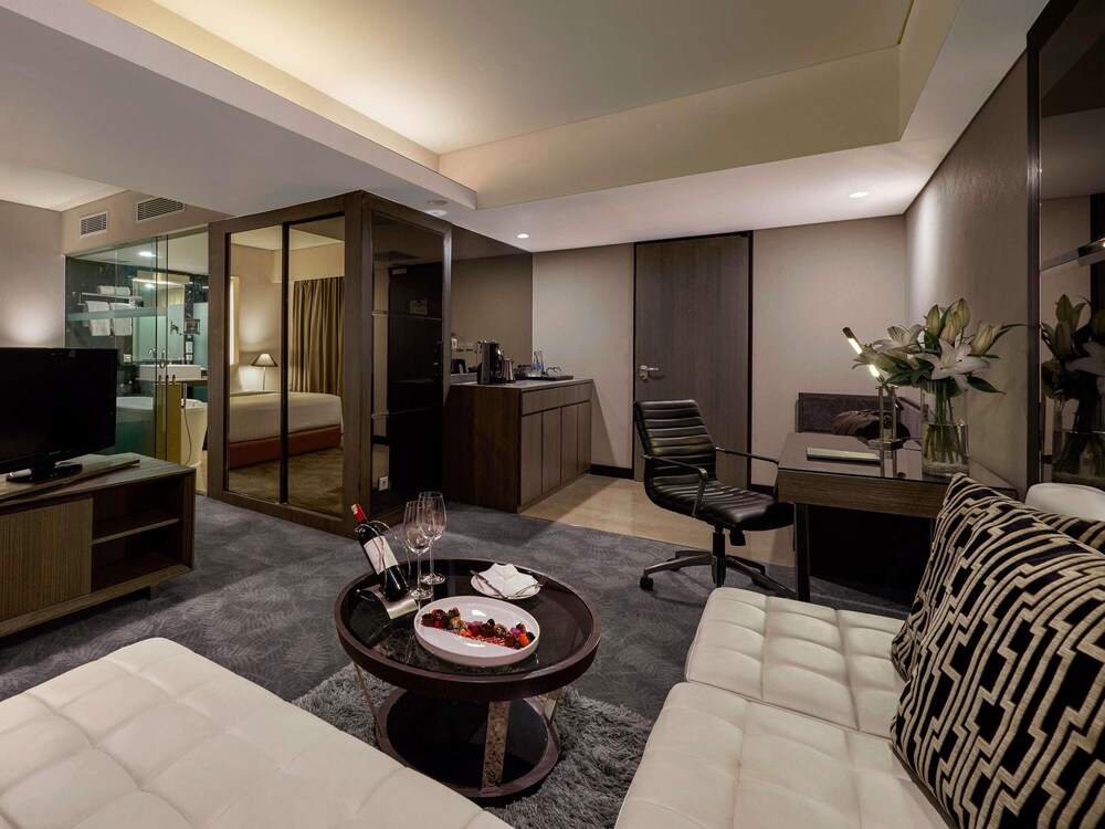 Habitación Deluxe, 2 camas individuales del hotel Pullman Jakarta Indonesia. Foto 2