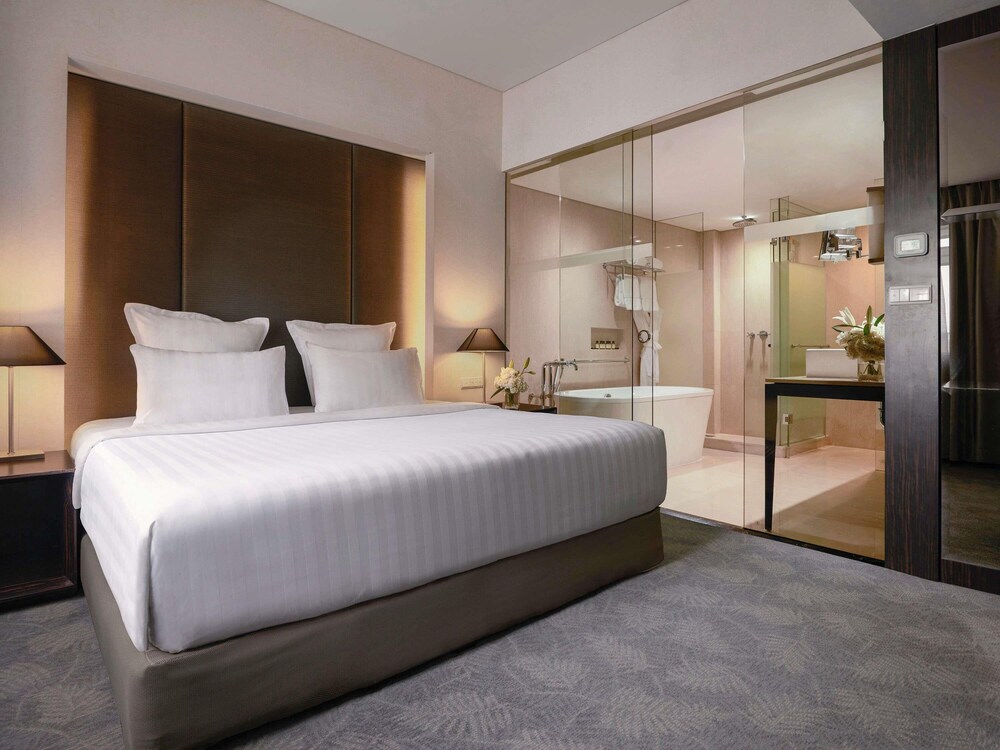 Apartamento Deluxe, 1 cama de matrimonio grande del hotel Pullman Jakarta Indonesia