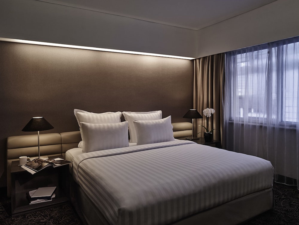 Habitación Deluxe, 1 cama de matrimonio grande del hotel Pullman Jakarta Indonesia. Foto 3