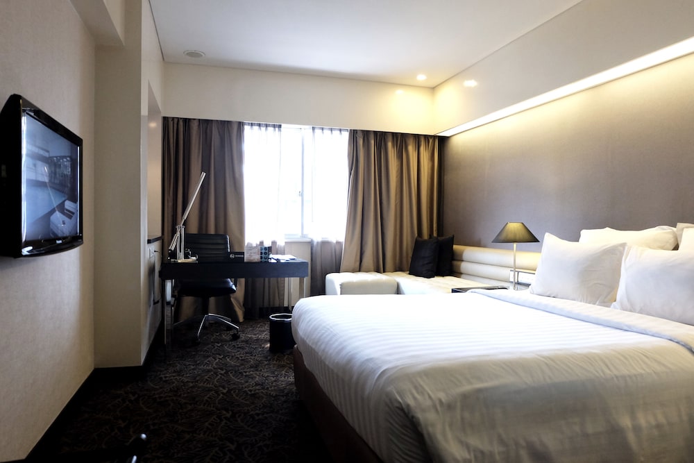 Habitación superior, 1 cama de matrimonio del hotel Pullman Jakarta Indonesia. Foto 2