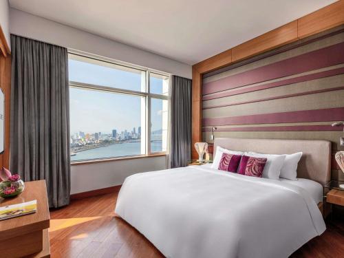 Suite Ejecutiva, vista al río, planta alta con acceso al Privilege Lounge del hotel Grand Mercure Danang. Foto 2