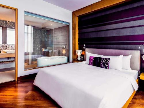 Suite Ejecutiva, vista al río, planta alta con acceso al Privilege Lounge del hotel Grand Mercure Danang. Foto 3