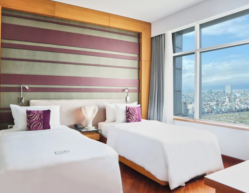 Habitación doble Vista Rio Superior 2 Camas individuales del hotel Grand Mercure Danang. Foto 1