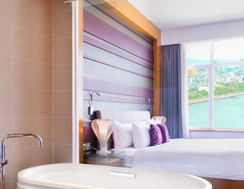 Suite Vista Rio Planta Alta Privilege 2 Camas individuales del hotel Grand Mercure Danang. Foto 1