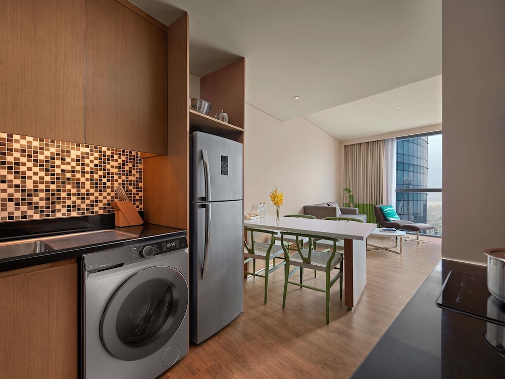 Apartamento de 1 Dormitorio, sala de estar, cocinas totalmente equipadas, bañera, 01 cama king del hotel Novotel Danang Premier Han River. Foto 2