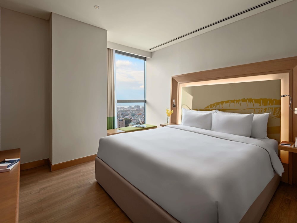 Apartamento de 1 Dormitorio, sala de estar, cocinas totalmente equipadas, bañera, 01 cama king del hotel Novotel Danang Premier Han River. Foto 3
