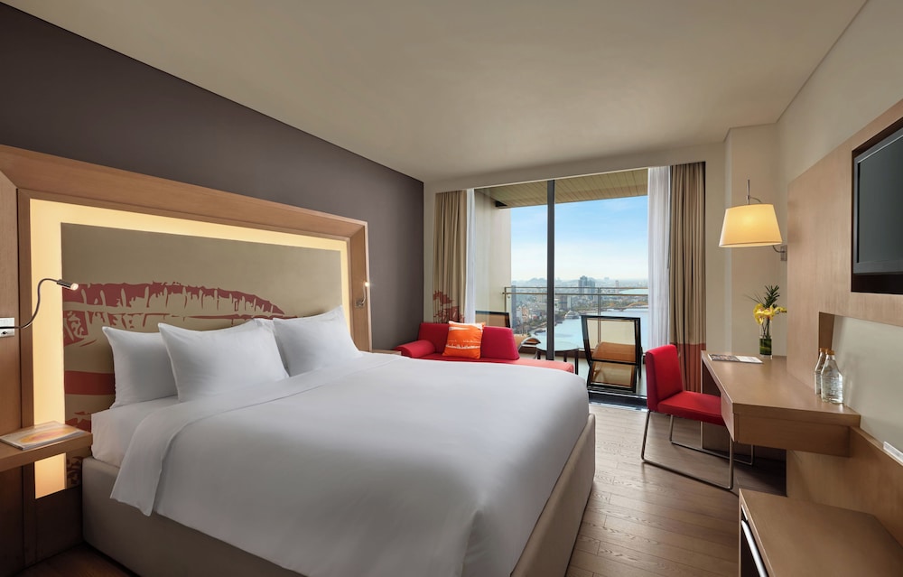 Habitación Deluxe, Balcón, Vista al Puente del Dragón - 1 Cama King del hotel Novotel Danang Premier Han River. Foto 3