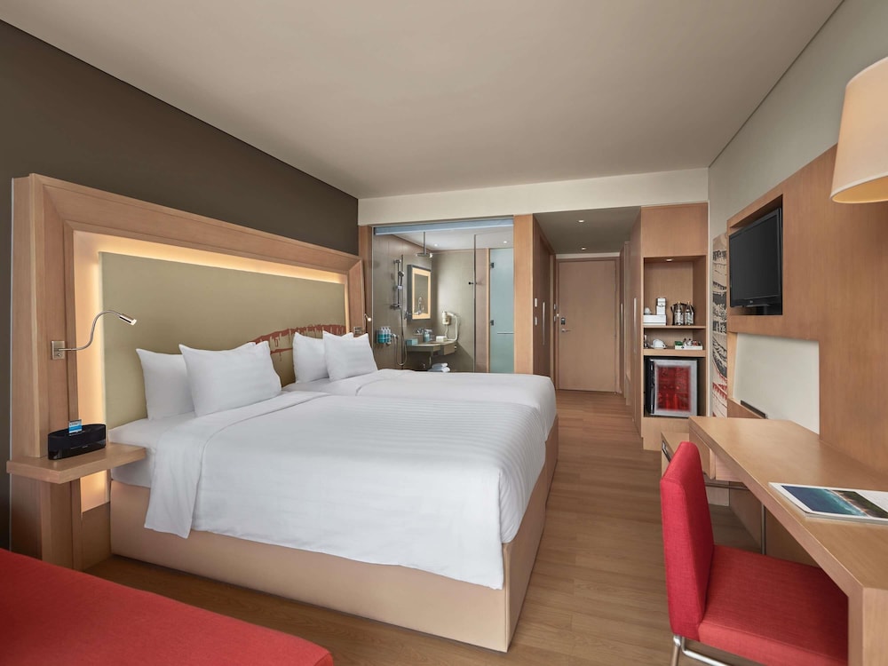 Habitación Ejecutiva, balcón con vista al río Han y acceso al Premier Lounge - 2 camas individuales del hotel Novotel Danang Premier Han River. Foto 8
