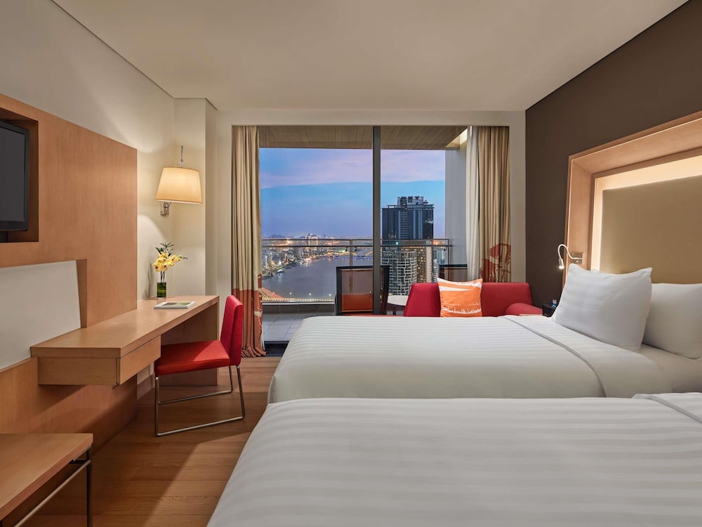Habitación Deluxe, Balcón, Vista al Puente del Dragón - 2 Camas Individuales del hotel Novotel Danang Premier Han River. Foto 3