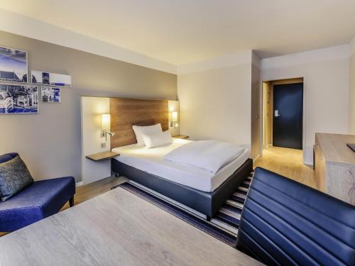 Habitación Superior con una cama doble o dos camas individuales del hotel Mercure Aachen Europaplatz. Foto 5