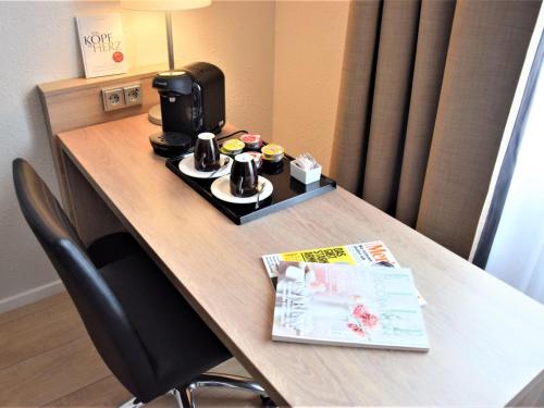 Habitación Superior con una cama doble o dos camas individuales del hotel Mercure Aachen Europaplatz. Foto 7