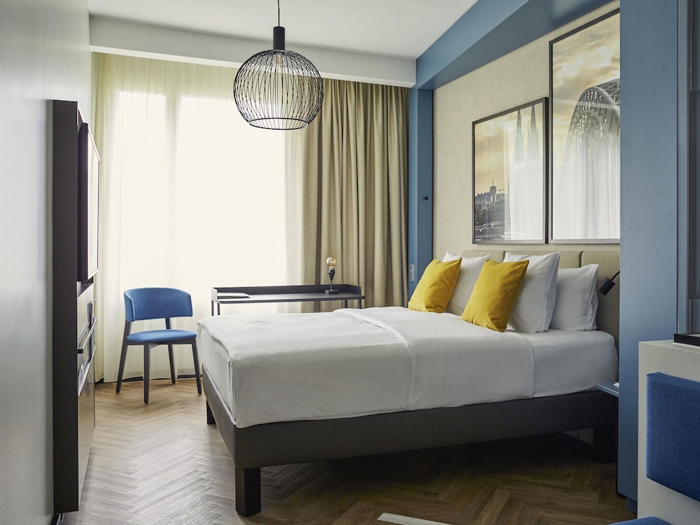 Habitación Deluxe con vistas a la Catedral del hotel Mondial Am Dom Cologne - Mgallery
