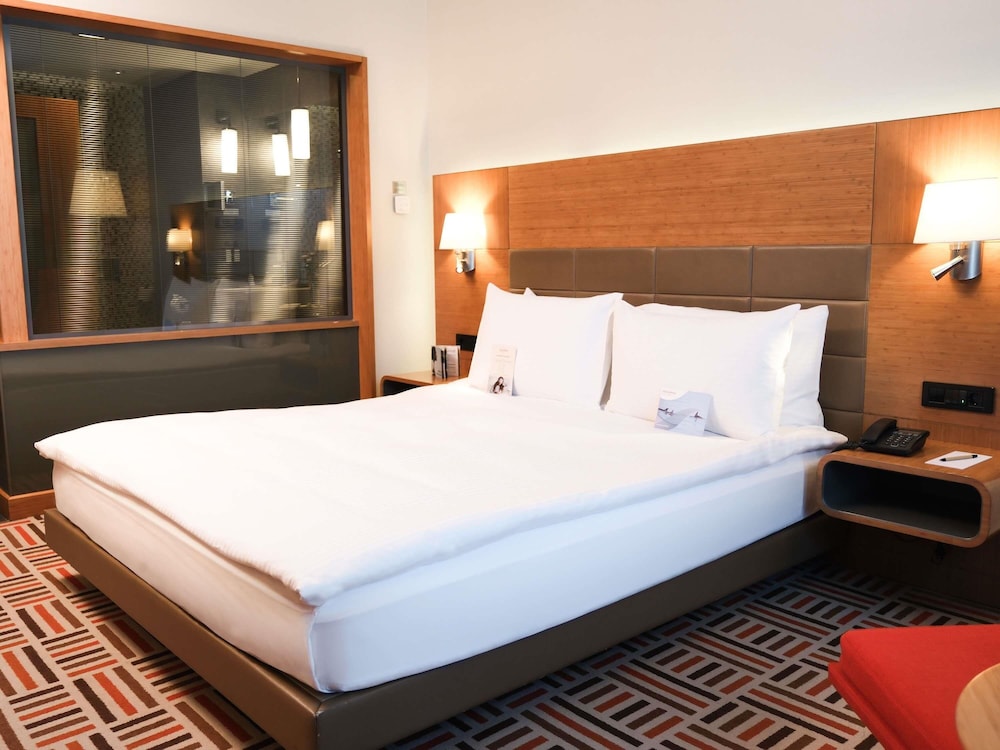 Suite Deluxe, 1 cama de matrimonio grande del hotel Mövenpick Ankara. Foto 1