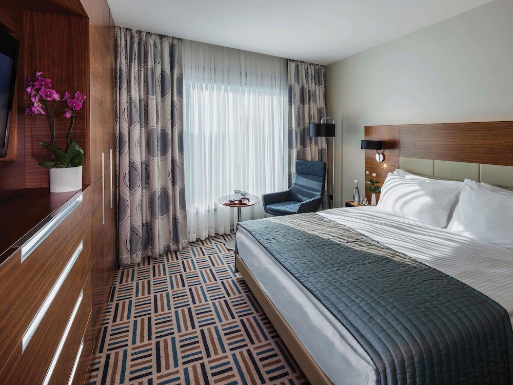 Suite Deluxe, 1 cama de matrimonio grande del hotel Mövenpick Ankara. Foto 6