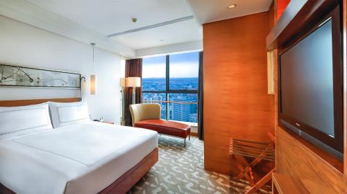 Suite Deluxe del hotel Swissotel Foshan. Foto 5