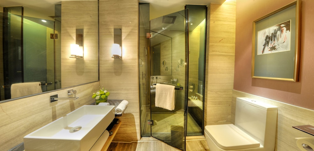 Habitación ejecutiva, 1 cama de matrimonio grande del hotel Grand Mercure Jinan Sunshine. Foto 2