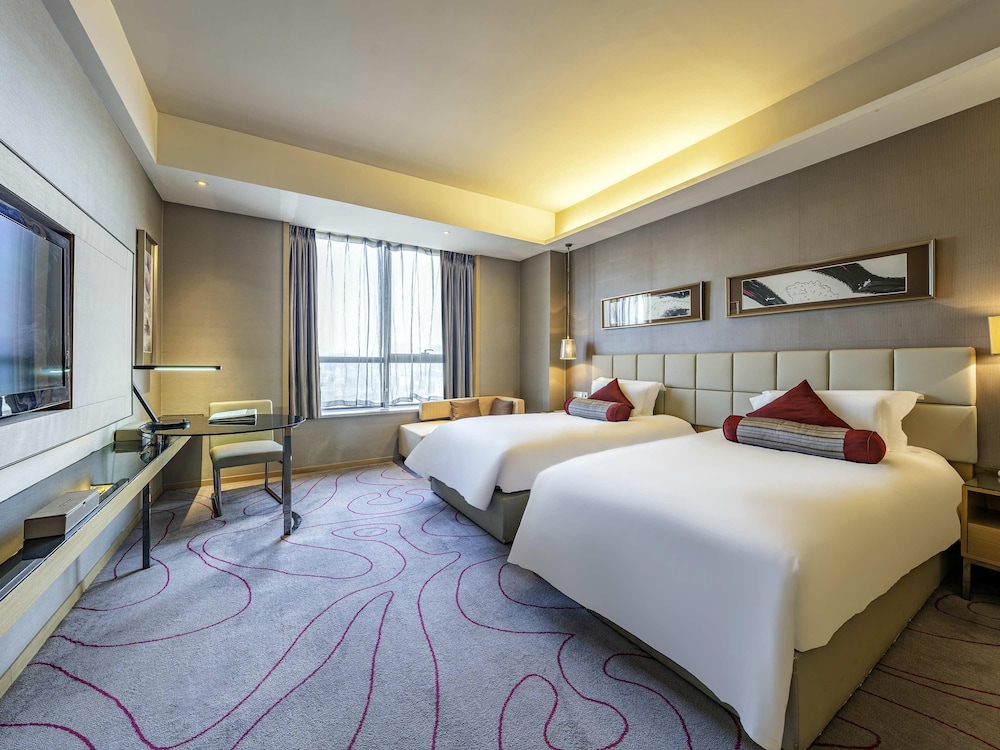 Habitación superior, 2 camas individuales del hotel Grand Mercure Jinan Sunshine. Foto 4