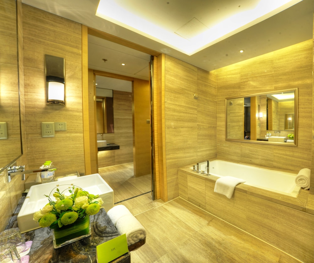 Suite ejecutiva, 1 cama doble del hotel Grand Mercure Jinan Sunshine. Foto 3