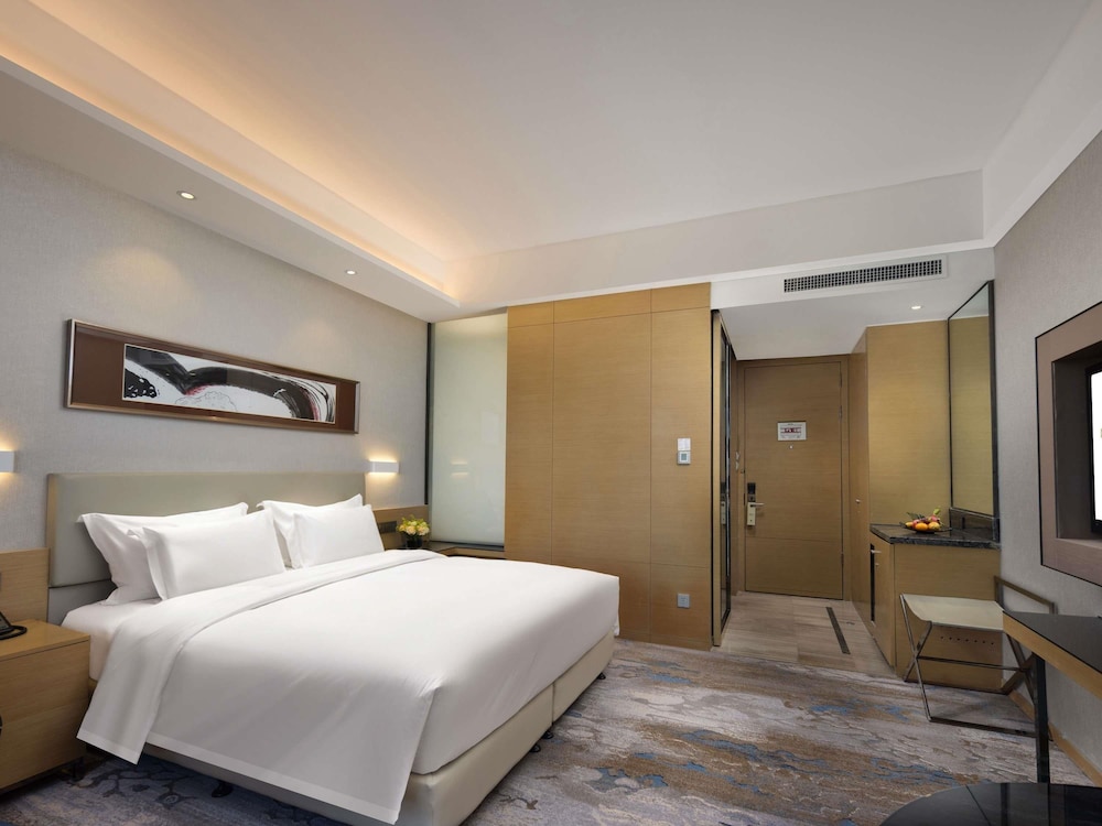 Habitación Deluxe, 1 cama de matrimonio grande, vistas a la ciudad del hotel Grand Mercure Jinan Sunshine