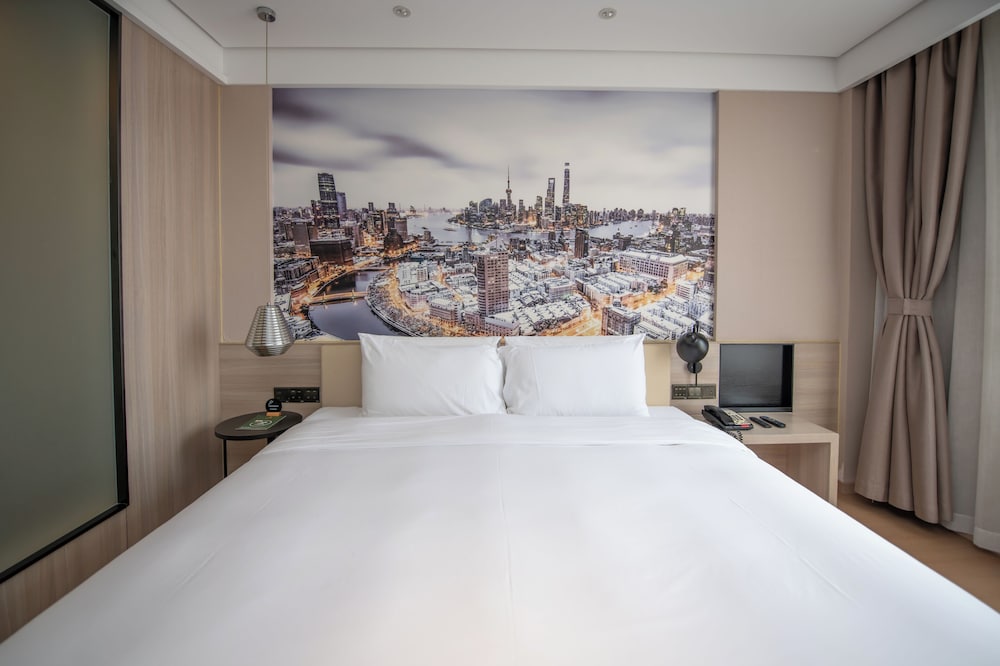 Habitación Deluxe, 1 cama de matrimonio grande del hotel Mercure Shanghai Pudong Zhangjiang Park