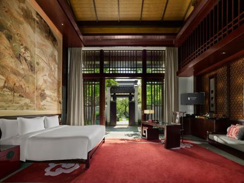 Villa con vistas al agua del hotel Banyan Tree Hangzhou. Foto 1