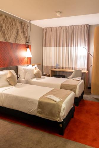 Habitación Doble - 2 camas del hotel Ibis Alger Aéroport. Foto 1