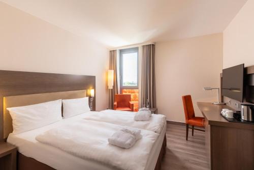 Habitación Superior - 1 cama grande del hotel Intercityhotel Berlin Airport Area North. Foto 2