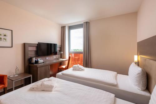 Habitación Doble Superior - 1 o 2 camas del hotel Intercityhotel Berlin Airport Area North. Foto 7