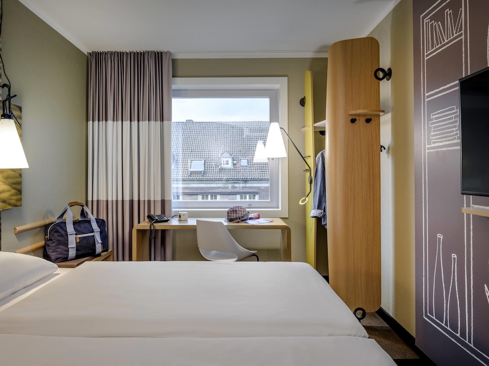 Habitación estándar con camas individuales del hotel Ibis Muenster City. Foto 2