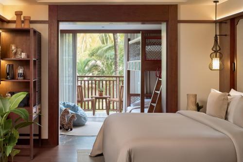 Suite Familiar con servicio de conserjería y vistas al jardín del hotel Paradisus by Meliá Bali. Foto 3