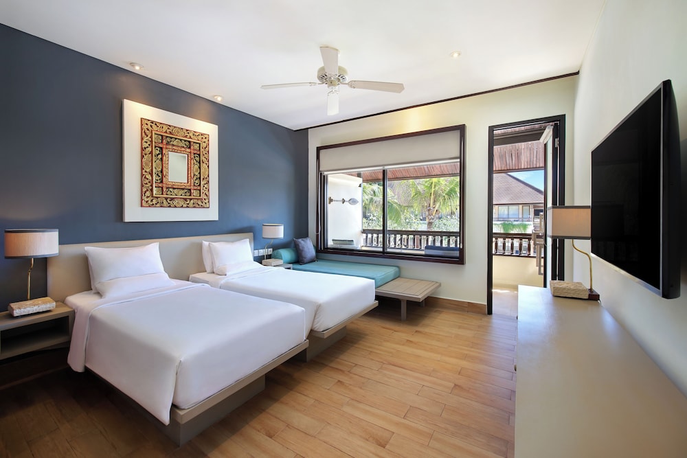 Habitación Deluxe, 1 cama de matrimonio grande, vistas a la piscina (Ubicada en el Garden Wing) del hotel Novotel Bali Benoa