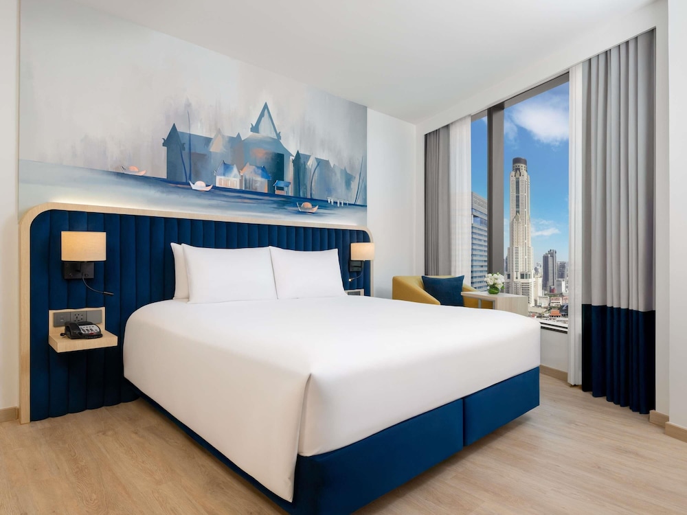 Habitación estándar con 1 cama king size del hotel Novotel Bangkok Platinum - Sha Extra Plus
