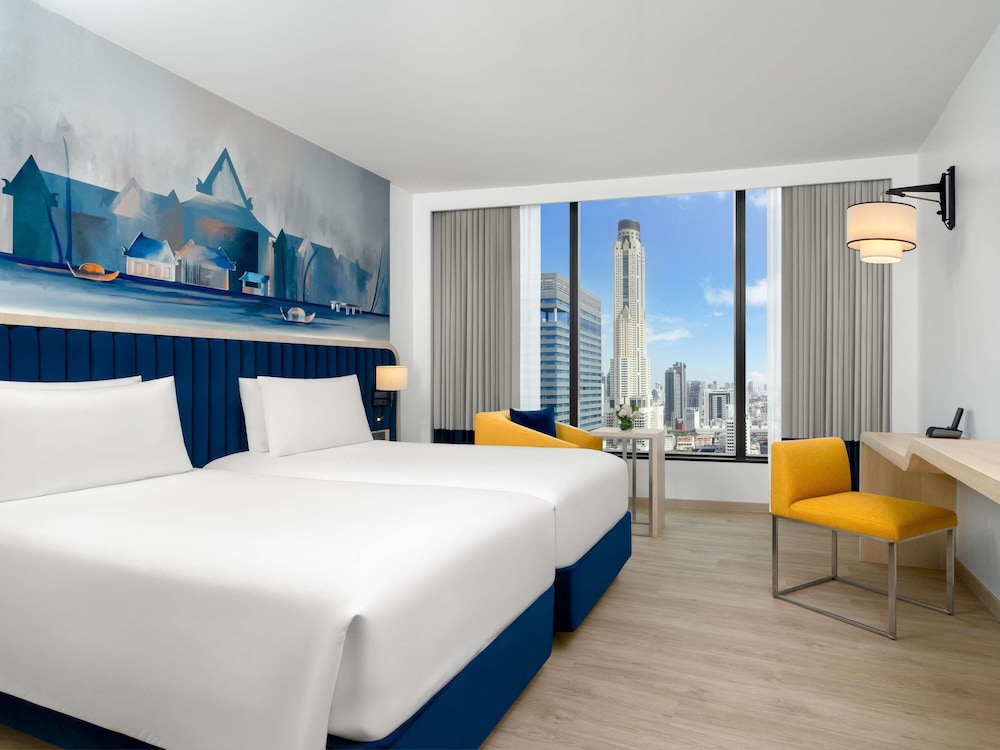 Habitación Deluxe con 2 camas individuales, vistas al parque del hotel Novotel Bangkok Platinum - Sha Extra Plus. Foto 2