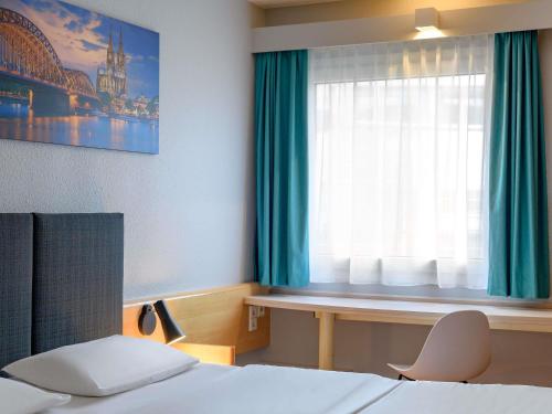 Habitación Doble Estándar del hotel Ibis Köln Frechen. Foto 3