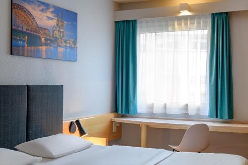 Habitación Doble Estándar del hotel Ibis Köln Frechen. Foto 9