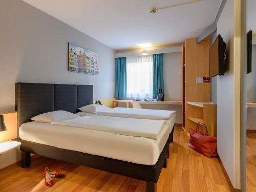Habitación Doble Estándar - 2 camas del hotel Ibis Köln Frechen. Foto 3