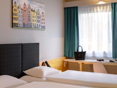 Habitación Doble Estándar - 2 camas del hotel Ibis Köln Frechen. Foto 5