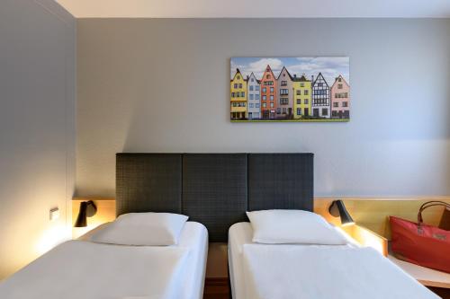 Habitación Doble Estándar - 2 camas del hotel Ibis Köln Frechen. Foto 8
