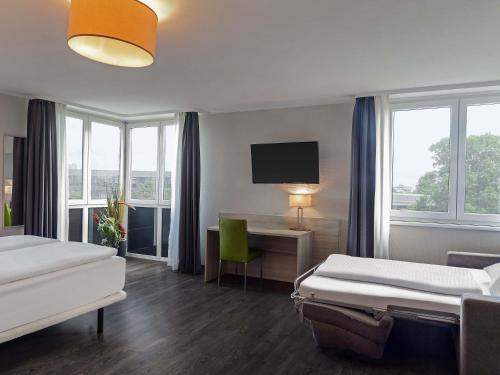 Habitación Triple del hotel Düsseldorf Krefeld Affiliated By Meliá