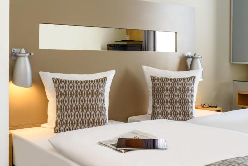 Habitación Doble Estándar - 2 camas del hotel Mercure Düsseldorf City Nord. Foto 2
