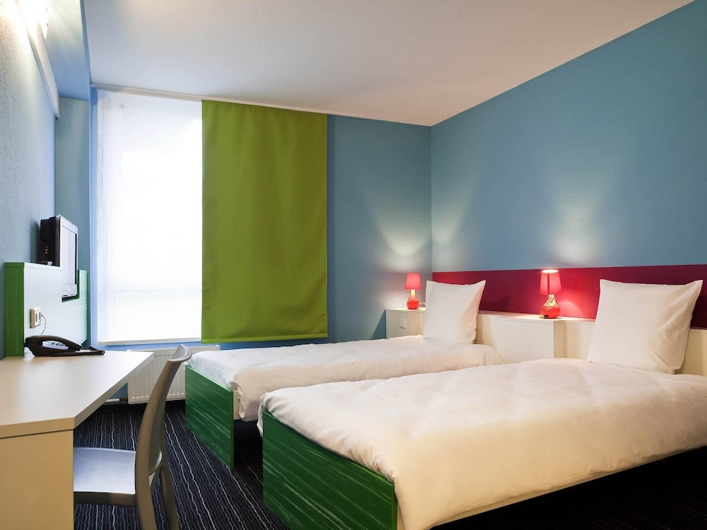 Habitación estándar con 2 camas individuales del hotel Ibis Styles Düsseldorf - Neuss. Foto 1