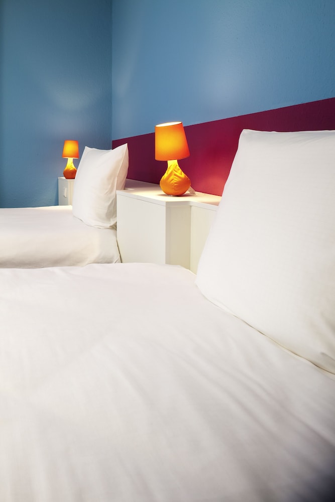 Habitación estándar con 2 camas individuales del hotel Ibis Styles Düsseldorf - Neuss. Foto 2