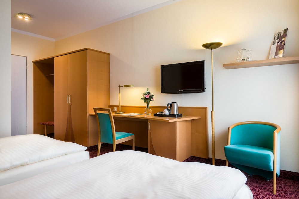 Habitación Standard con 2 camas individuales del hotel Mercure Ingolstadt. Foto 1